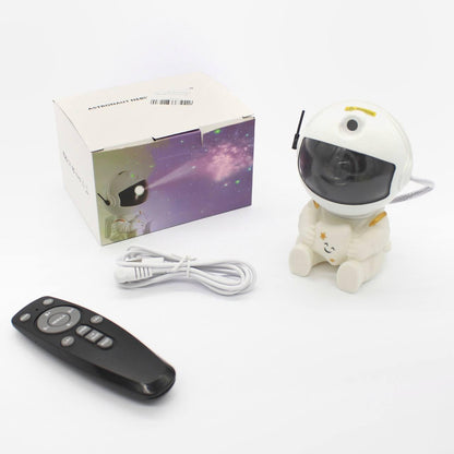 Нічник проектор зоряного неба Космонавт, з USB і пультом / Нічник з проекцією зоряне небо / Нічний світильник Астронавт