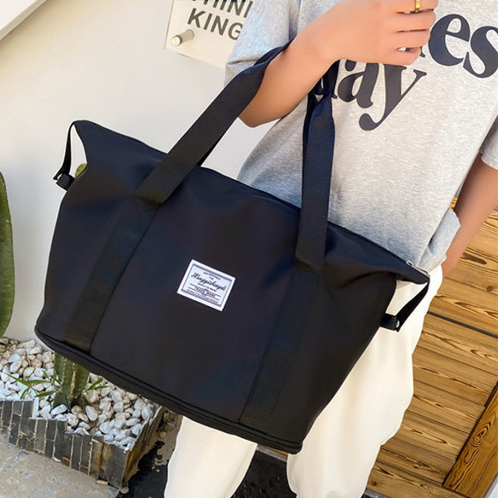 Жіноча дорожня сумка-трансформер 55х42х21см, XL-1029, Чорна / Складна сумка для подорожей