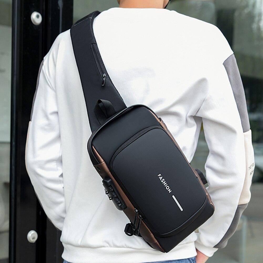 Сумка-рюкзак через плече (31х17см) 6995, з кодовим замком, Чорна із золотистим / Водонепроникна чоловіча сумка