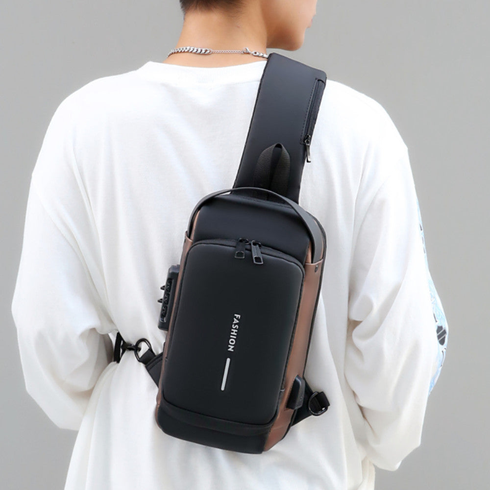 Сумка-рюкзак через плече (31х17см) 6995, з кодовим замком, Чорна із золотистим / Водонепроникна чоловіча сумка