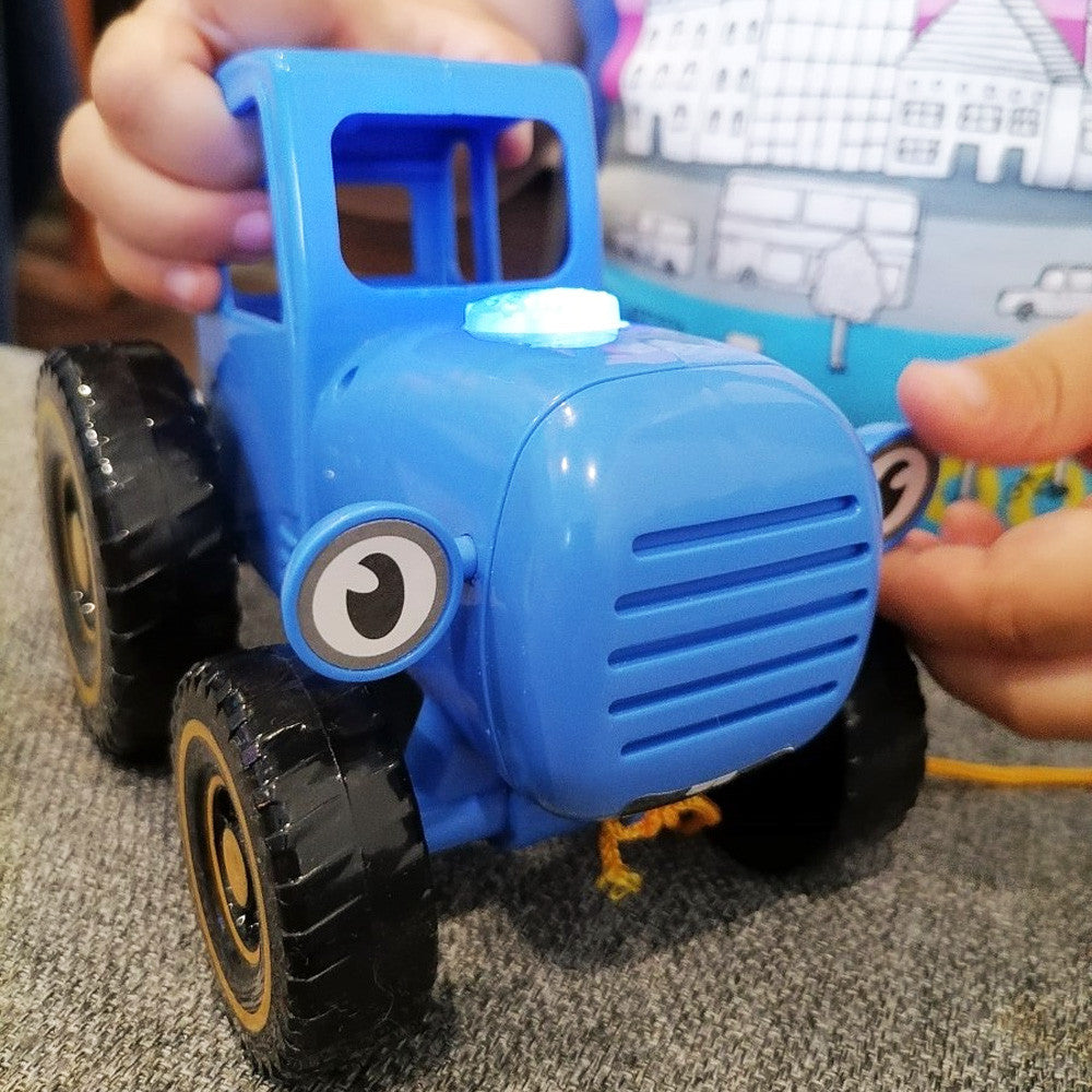 Дитячий музичний трактор "Синій велетень" (15 мелодій та звуків, на батарейках) / Інтерактивна іграшка, що розвиває