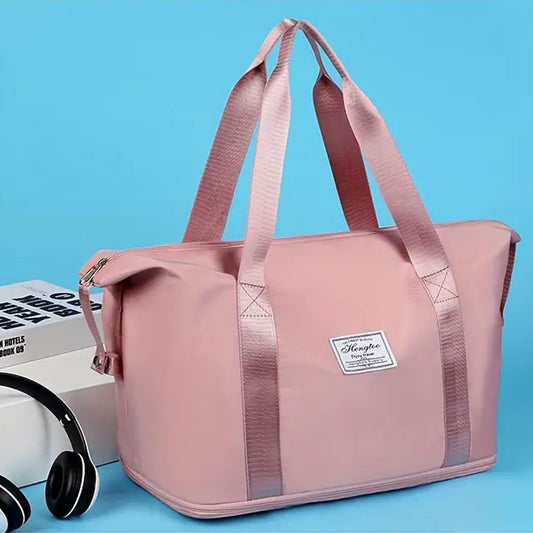 Жіноча дорожня сумка-трансформер 55х42х21см, XL-1029, Рожева / Складна сумка для подорожей