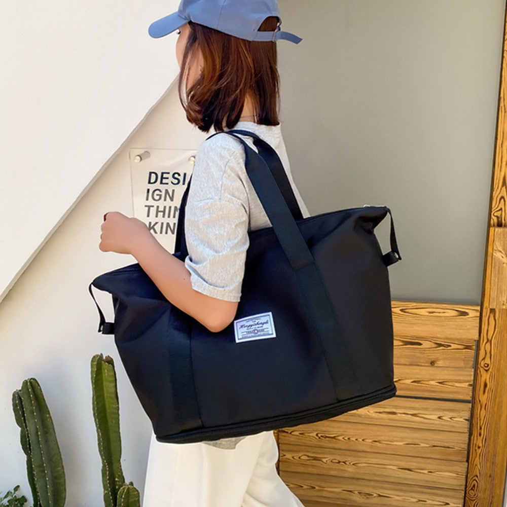 Жіноча дорожня сумка-трансформер 55х42х21см, XL-1029, Чорна / Складна сумка для подорожей