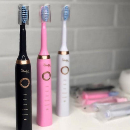 Електрична зубна щітка Shuke з 4 насадками Рожева / Акумуляторна зубна щітка / Зубні щітки